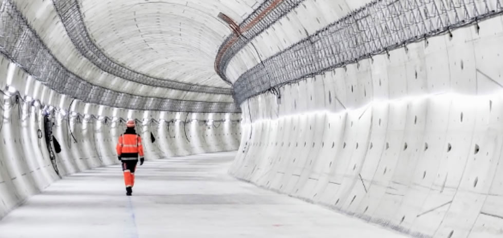 Man Hi-Vis Safety Clothing Walking Through White Tunnel