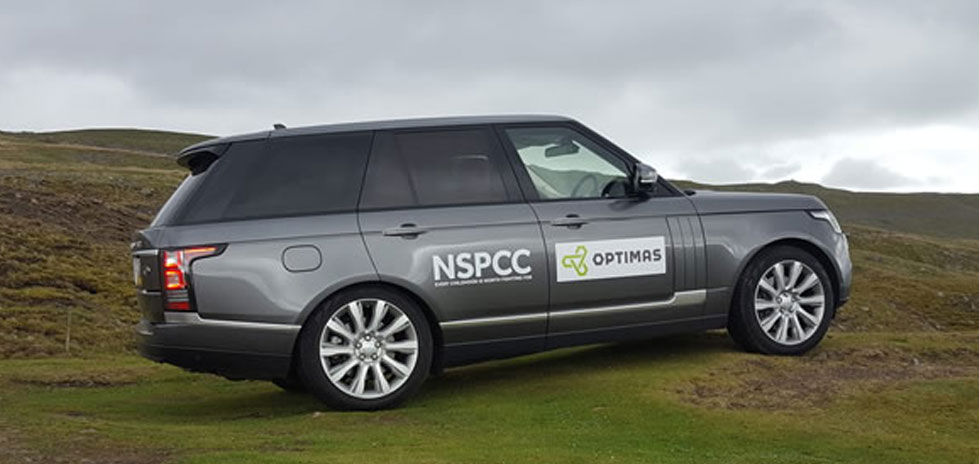 Grey Land Rover Range Rover NSPCC Optimas Logo Green Field